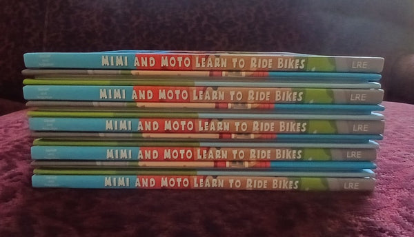 Mimi and Moto Learn to Ride Bikes